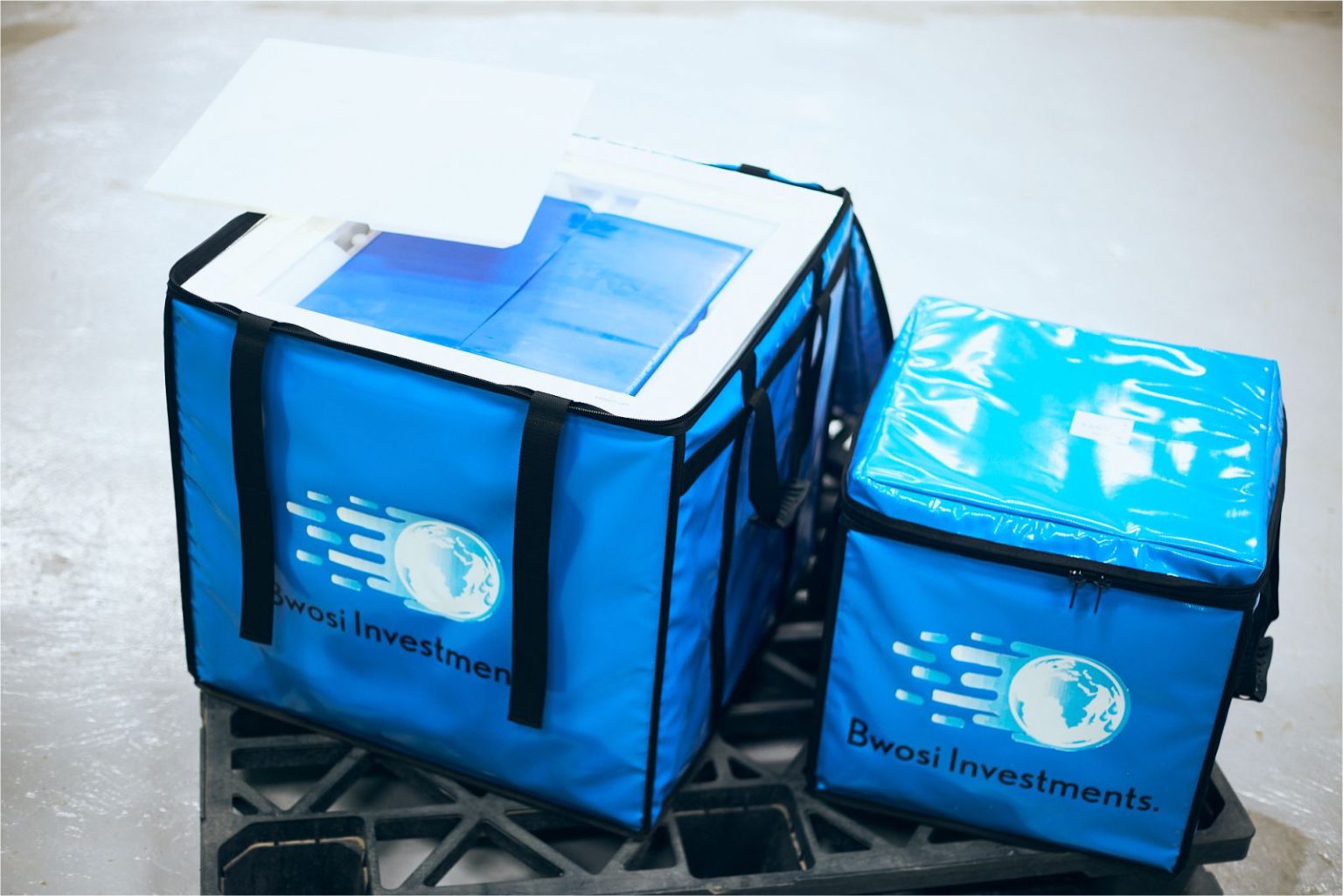 Two Bwosi Investments cold chain cooler boxes, opened and closed